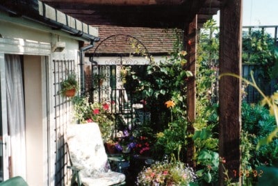 Picture of a mirror placed in the garden